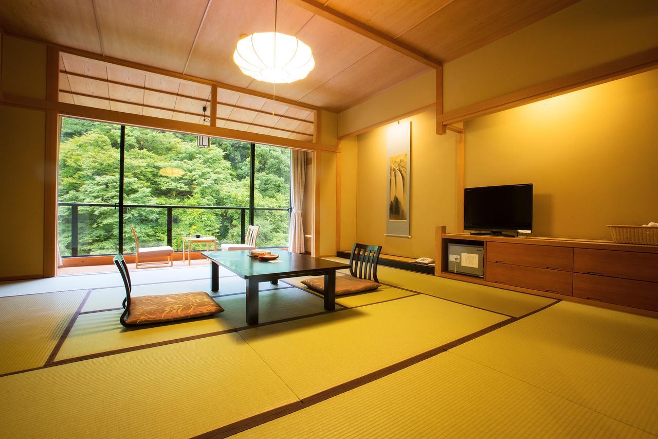 فندق Osawa Onsen Sansuikaku هاناماكي الغرفة الصورة