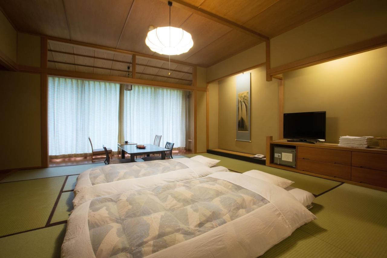 فندق Osawa Onsen Sansuikaku هاناماكي الغرفة الصورة